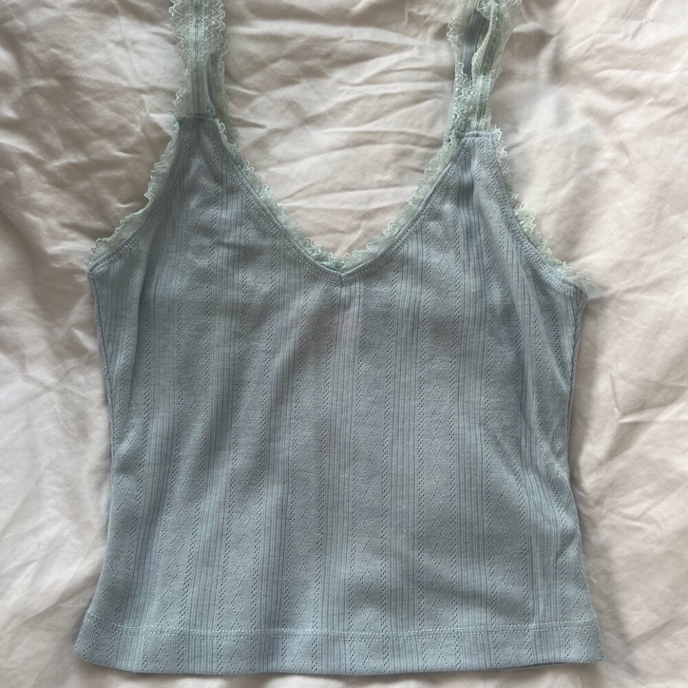 Dolls kill light blue embroidered tank top with lace straps.Never worn brand new